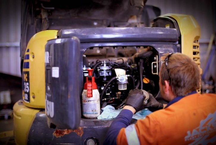 plant repairs newcastle man is repairing the zero tail excavator