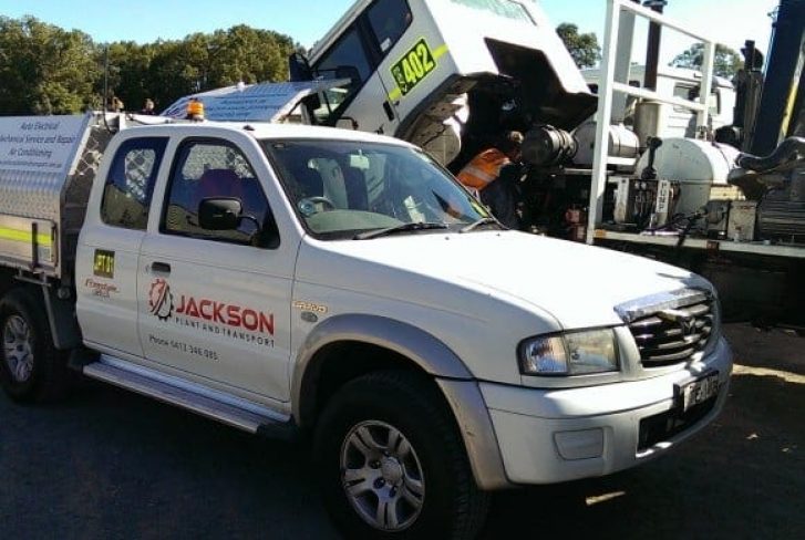 Jackson Plant and Transport white mini truck